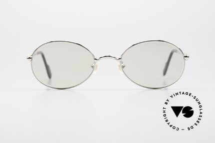 Cartier Saturne Small Oval Frame Changeable, model from the 'Thin Rim' series by Cartier (lightweight), Made for Men and Women