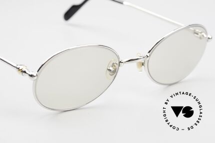 Cartier Saturne Small Oval Frame Changeable, new changeable lenses (darken automatically in the sun), Made for Men and Women