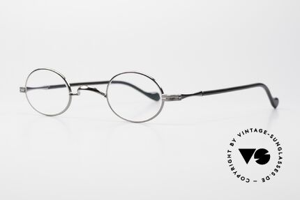 Lunor II A 04 XS Oval Eyeglasses Gunmetal, plain design with a W-shaped bridge; GUNMETAL finish, Made for Men and Women
