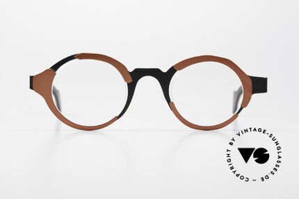 Theo Belgium Eye-Witness UC Designer Glasses Ladies & Gents, this model looks apparently unfinished & asymmetrical, Made for Men and Women