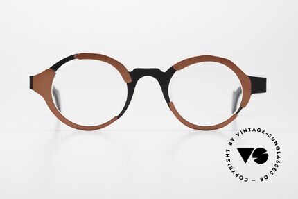 Theo Belgium Eye-Witness UC Ladies And Gents Eyewear, this model looks apparently unfinished & asymmetrical, Made for Men and Women