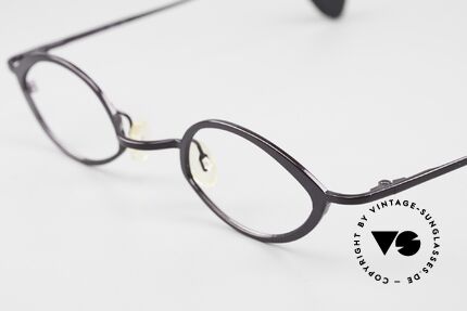 Theo Belgium Leo Purple Ladies Eyeglasses, the frame finish looks "dark PURPLE" metallic, Made for Women