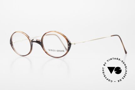 Giorgio Armani 363 90's Unisex Eyeglasses Oval, lightweight plastic front with thin "wire temples", Made for Men and Women