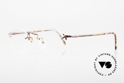 Giorgio Armani 195 Rimless Vintage Frame Oval, rimless frame design with discreet elegant coloring, Made for Men and Women