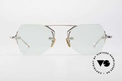 Jacques Marie Mage Yuma Rimless Titanium Sunglasses, striking frame bridge; inspired by the Yuma Crossing, Made for Men and Women