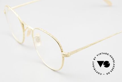 Oliver Peoples OP48 Old Vintage Gold-Plated, combined with the intellectual styling of the 1960's, Made for Men and Women