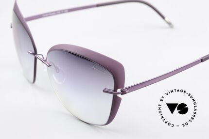 Silhouette 8166 With Mirrored Sun Lenses, rimless titanium frame with plastic lens front, Made for Women