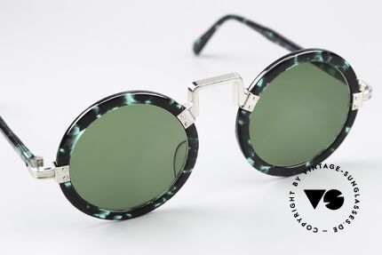 Jean Paul Gaultier 58-0275 90's Frame Emerald Marbled, also known accordingly as “steampunk sunglasses”, Made for Men and Women
