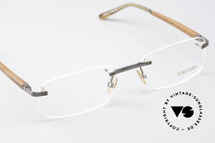 Tom Ford TF5080 Rimeless Wooden Temples, the designer frame can of course be glazed as desired, Made for Men and Women
