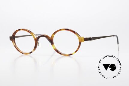 Lindberg 1011 Acetanium Oval Designer Glasses Small, oval Lindberg Acetanium frame with interesting color, Made for Men and Women