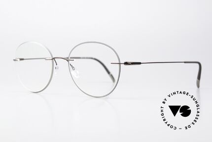 Silhouette 5500 Colorwave Core Accent Series, strikingly round rimless glasses with “acetate core”, Made for Men and Women