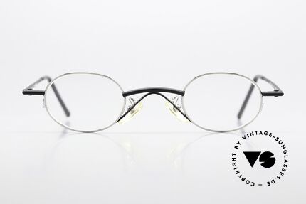 Christian Roth 2400 Small Oval 90's Eyewear, frame finish with "shiny silver" & "matte black", Made for Men and Women