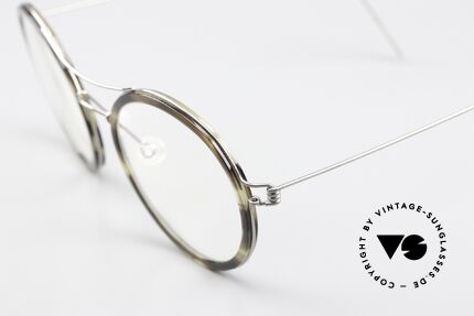 Lindberg Camilla Air Titan Rim Interesting Frame Coloring, striking refined Air Titan frame with Acetate inner rim, Made for Women