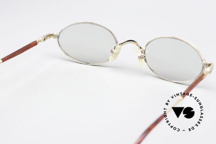 Matsuda 10116 Lenses Darken In The Sun, model also very similar to the J. Paul Gaultier 57-7201, Made for Men and Women