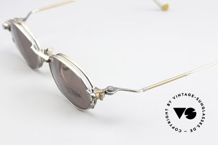 Jean Paul Gaultier 55-8106 Oval Vintage Frame Clip-On, the costly frame looks antique-silver; in size 46-20, Made for Men and Women