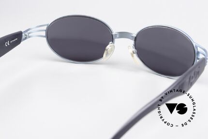 Jean Paul Gaultier 58-7203 Turquoise Metallic Finish, sun lenses (100% UV) can be replaced with opticals, Made for Men and Women