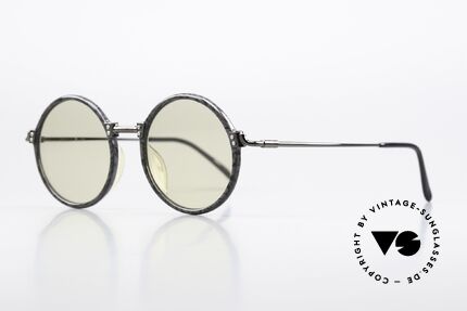Jean Paul Gaultier 55-7261 Lenses Darken Automatically, mineral lenses automatically darken in the sun, Made for Men and Women