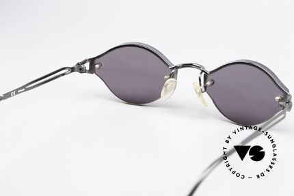 Jean Paul Gaultier 56-7111 Rimless Designer Sunglasses, solid gray plastic sun lenses (for 100% UV protection), Made for Men and Women