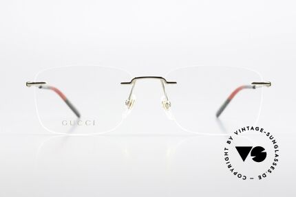 Gucci GG0399O Rimless Frame Made In Italy, gold-plated frame with temple ends in Gucci colors, Made for Men