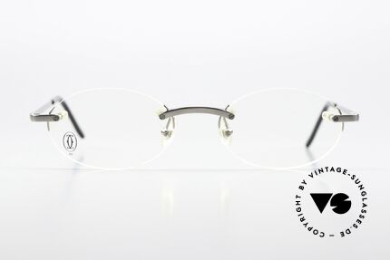 Cartier T-Eye Oval Titanium Frame Rimless, the "O" stands for OVAL, in size 49/19; 135mm, Made for Men and Women