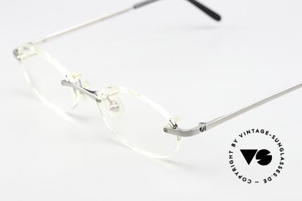 Cartier T-Eye Oval Titanium Frame Rimless, titanium frame with smooth platinum finish, Made for Men and Women