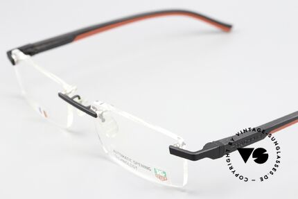 Tag Heuer 0842 Automatic Open Temples With One Hand, and the straight temples are covered with elastomer, Made for Men Tag Heuer 0842 Automatic Open Temples With One Hand, and the straight temples are covered with elastomer, Made for Men