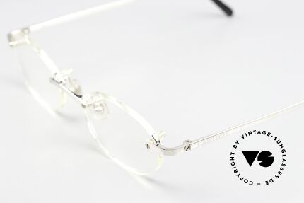 Cartier T-Eye Oval Platinum-Plated Glasses, titanium frame with shiny PLATINUM FINISH, Made for Men and Women