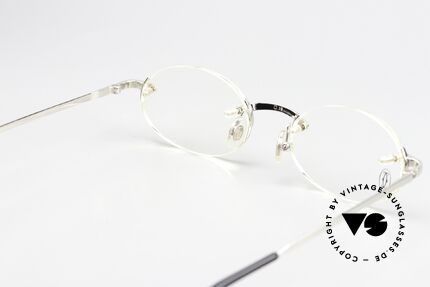 Cartier T-Eye Oval Platinum-Plated Glasses, lens size (gliding lens) can be changed if needed, Made for Men and Women
