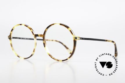 Mykita Anana Feminine Round Eyeglasses, color 916 is called 'Cocoa Sprinkles / Shiny Graphite', Made for Women